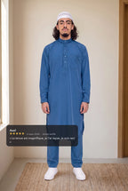 Qamis Sofiane bleu porté en intérieur, avec l'avis cinq étoiles d'un client